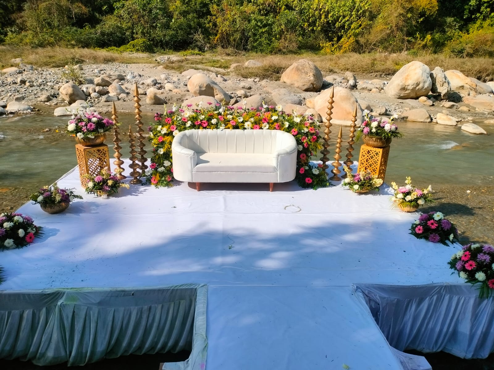 Team setting up wedding décor on the ground